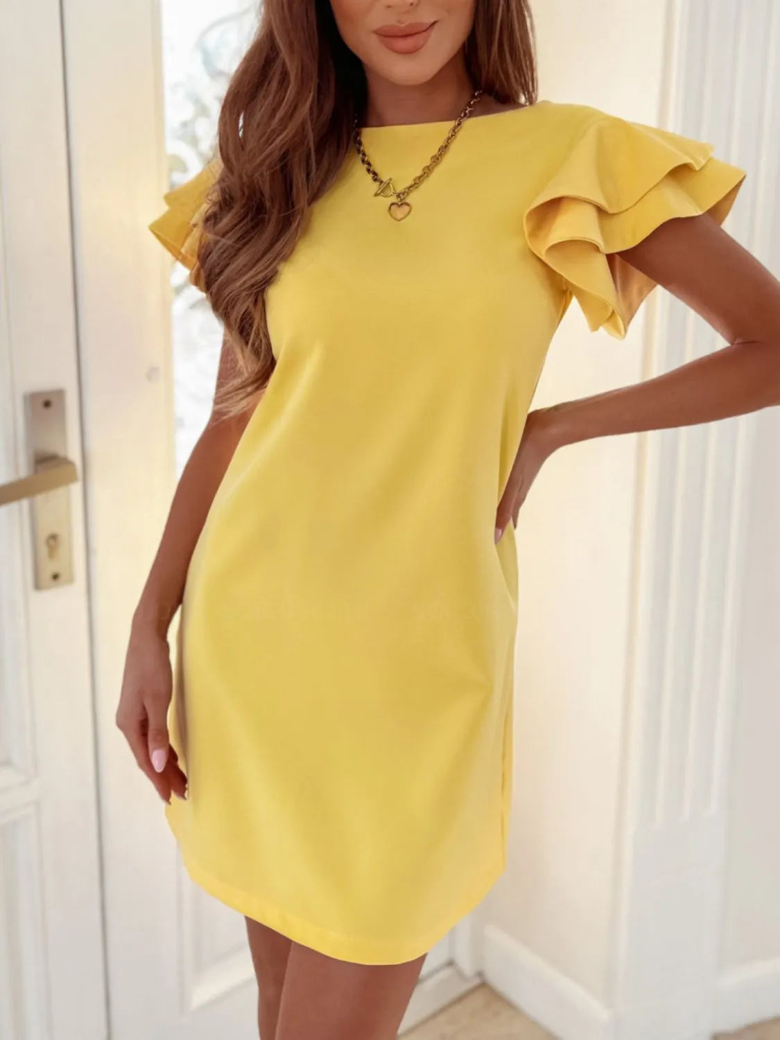 Bridget - Elegante minivestido de manga corta con capa de volantes