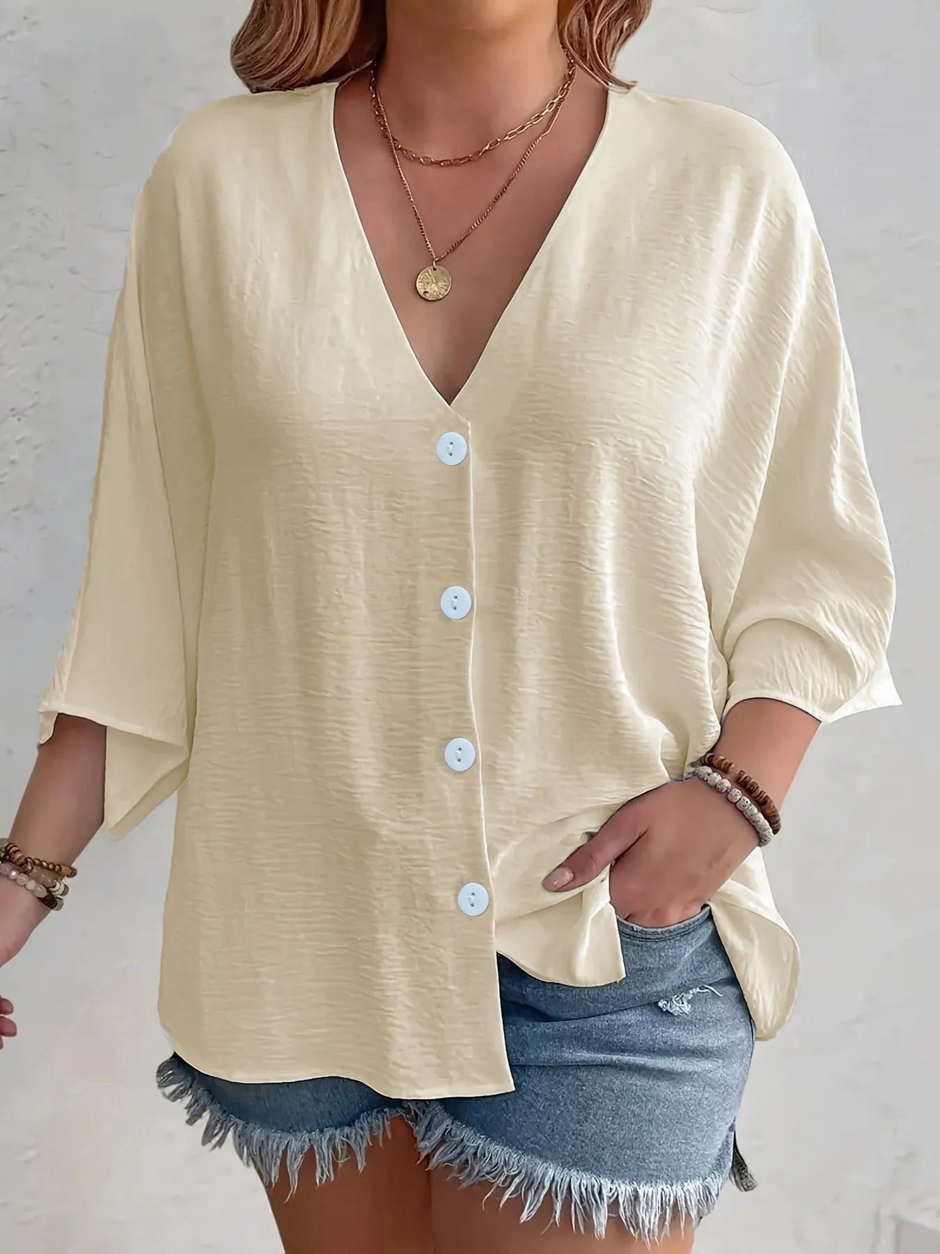 Amirah - Blusa casual suelta de media manga con cuello en V y botones