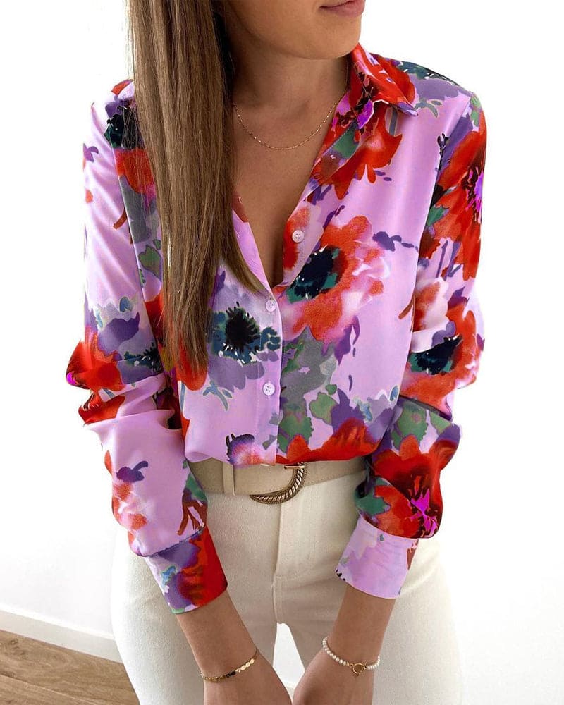Cristal - Elegante blusa floral de manga larga