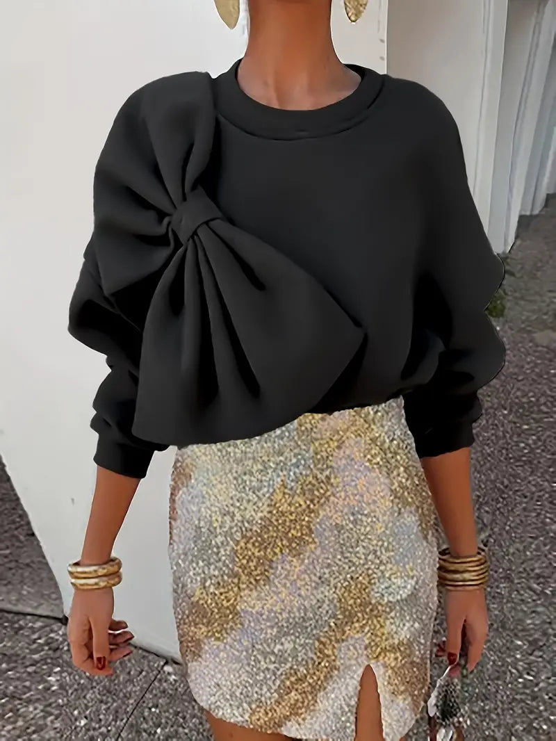 Benia – Suéter elegante con un gran lazo
