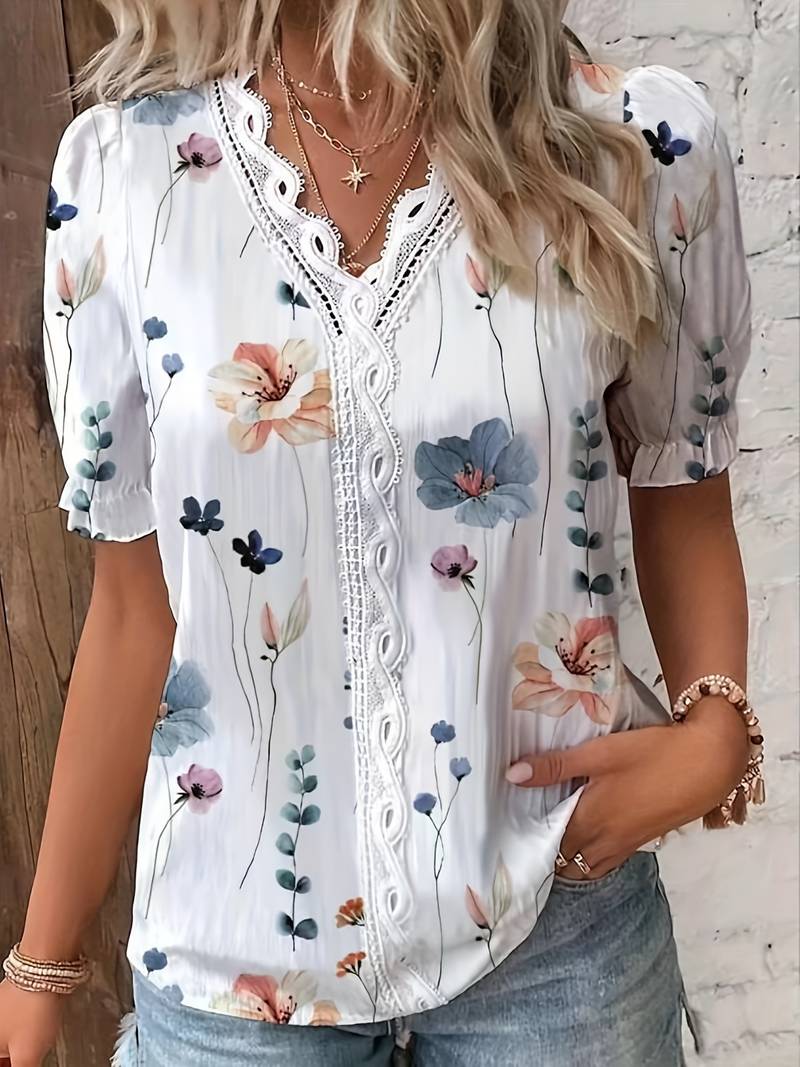 Annette - Elegante blusa floral con cuello de pico