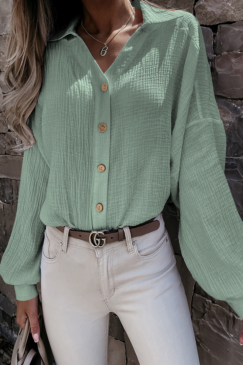 Kitty - Elegante blusa de manga larga con cuello vuelto y botones