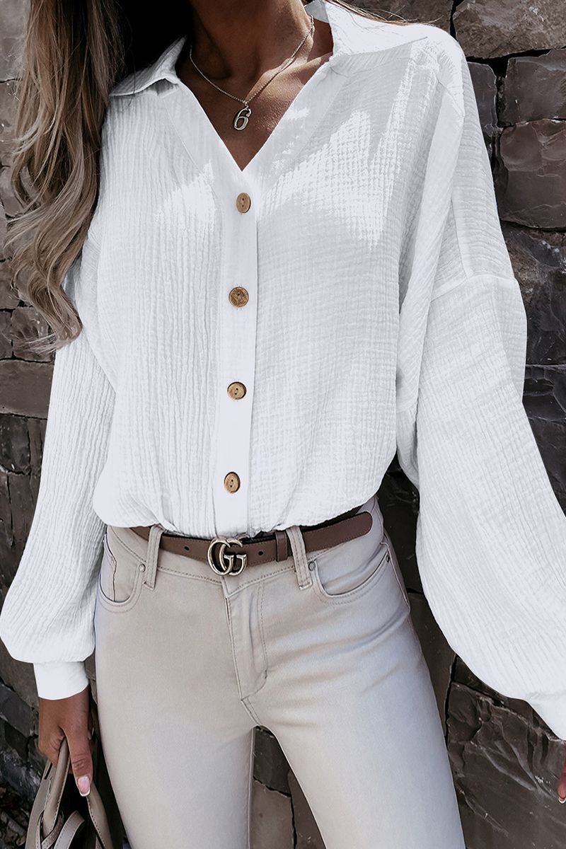 Kitty - Elegante blusa de manga larga con cuello vuelto y botones