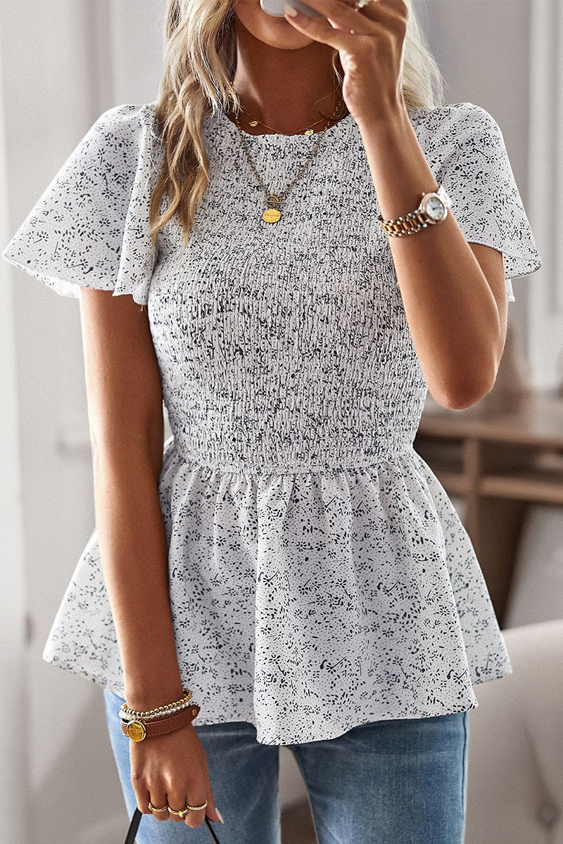 Louisa - Estilosa blusa floral de manga corta con dobladillo de volantes