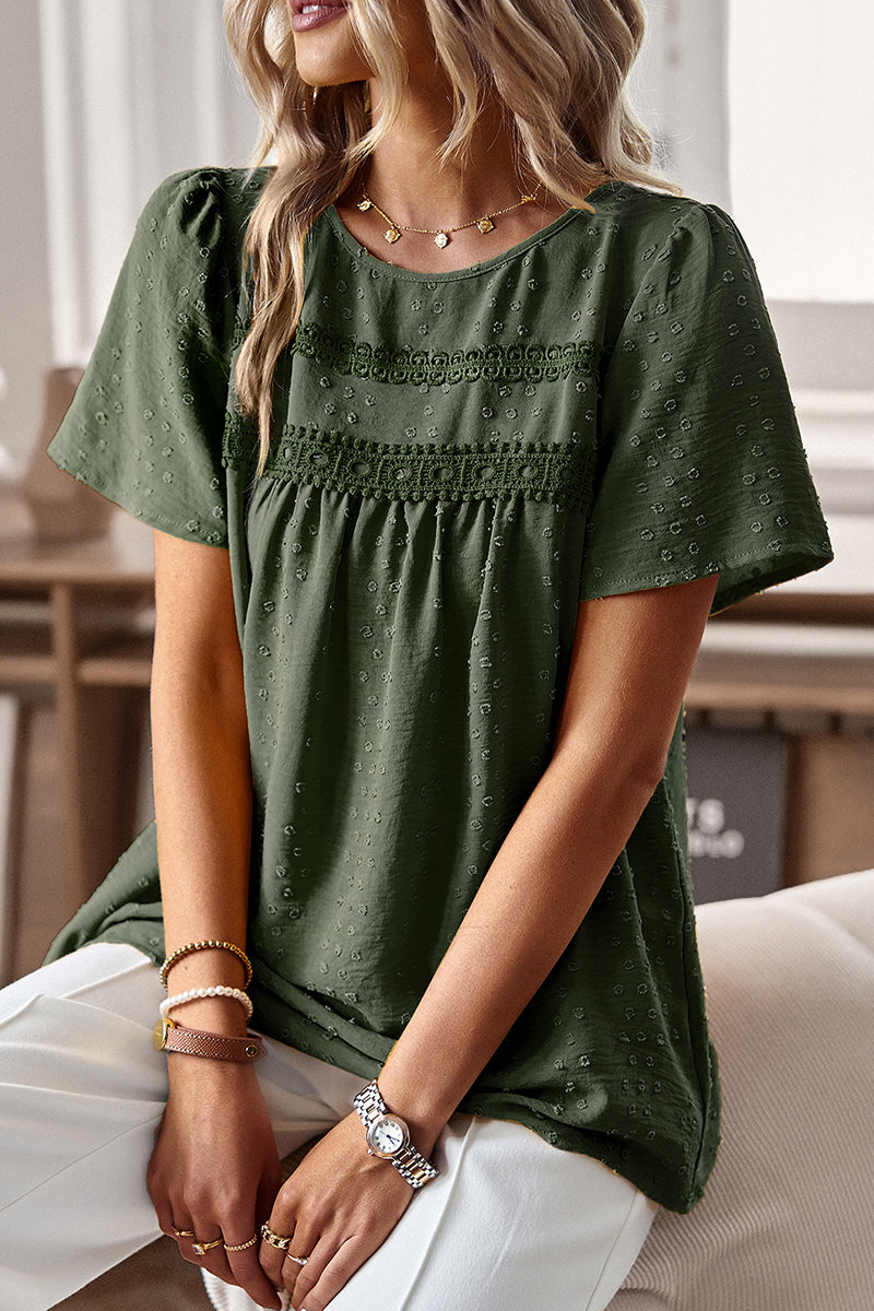 Lisa - Elegante blusa de manga corta con lunares
