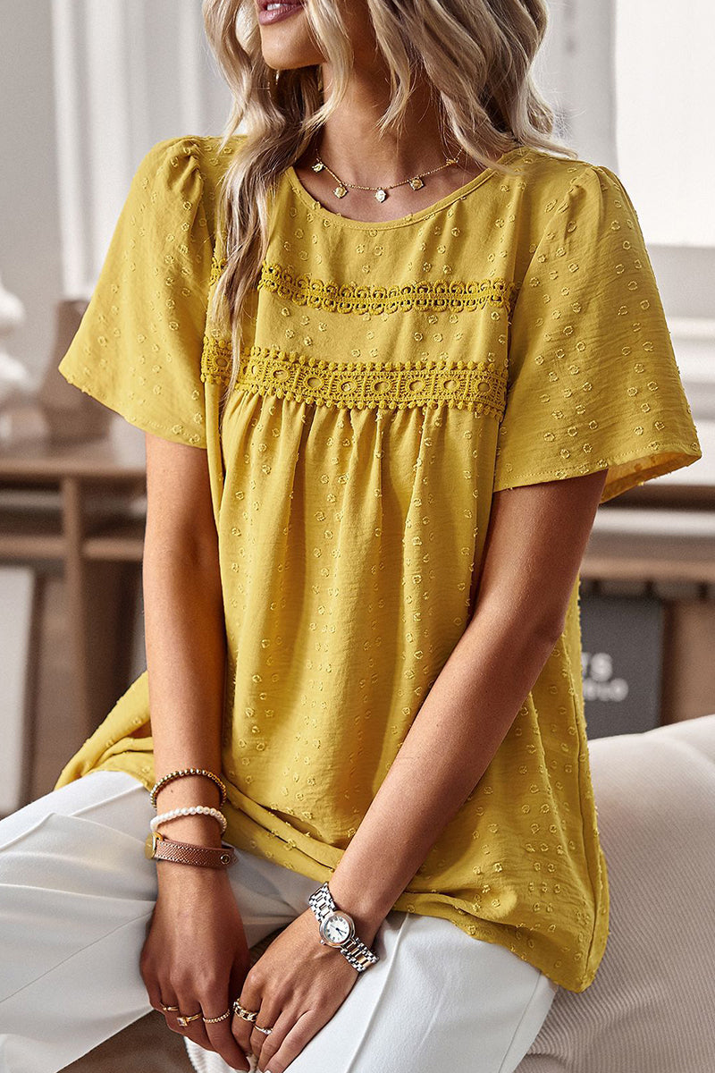Lisa - Elegante blusa de manga corta con lunares
