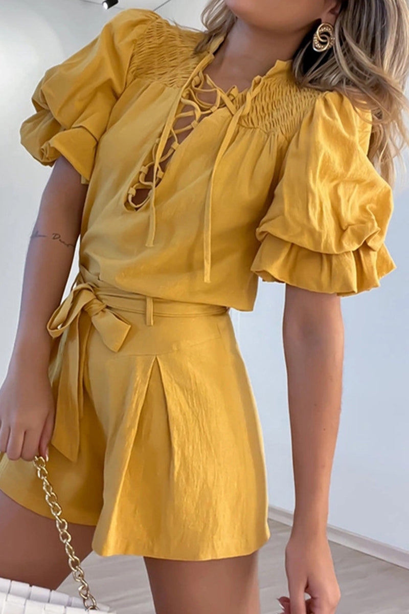 Minda - Elegante pelele con mangas de volantes y cintura alta