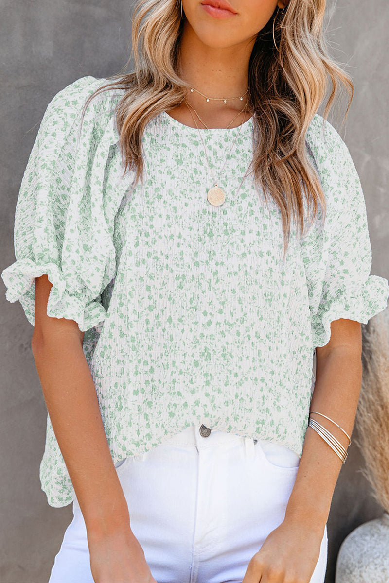 Marlene - Elegante blusa floral con mangas abullonadas