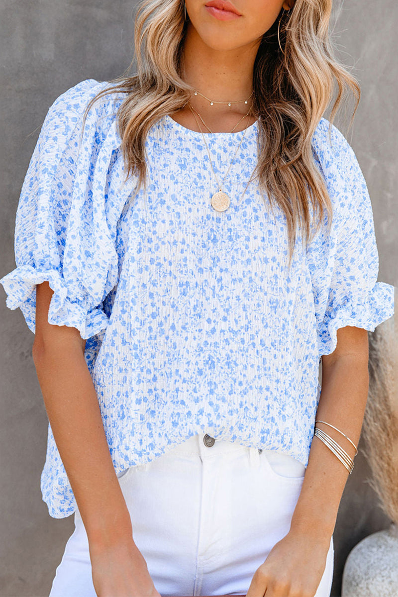 Marlene - Elegante blusa floral con mangas abullonadas