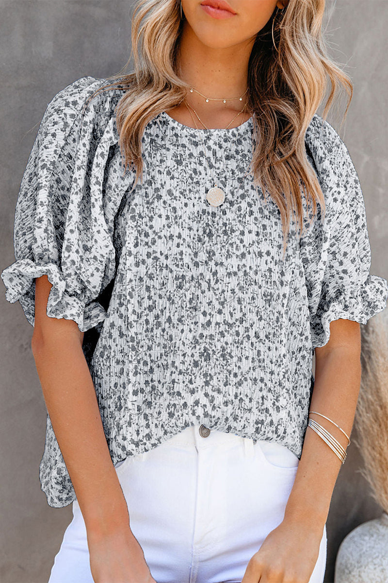 Marlene - Elegante blusa floral con mangas abullonadas