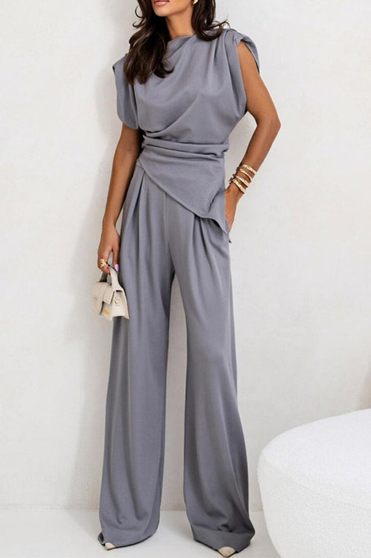 Madeleine - Elegante conjunto de blusa sin mangas y pantalón con pliegues