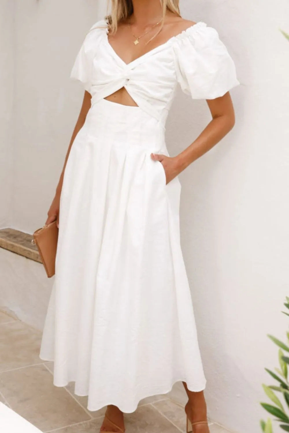 Nicolle - Elegante vestido con mangas abullonadas