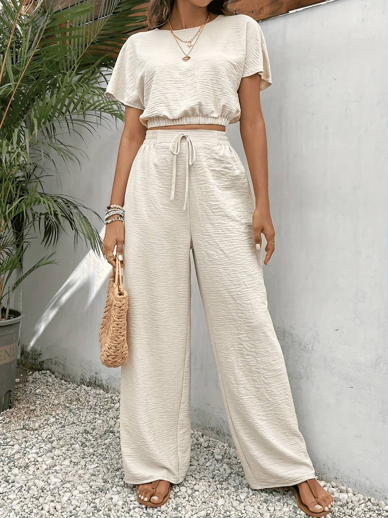Eleanora - Camiseta crop top chic y pantalón de cintura alta