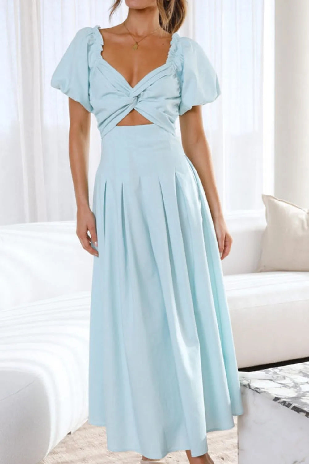 Nicolle - Elegante vestido con mangas abullonadas