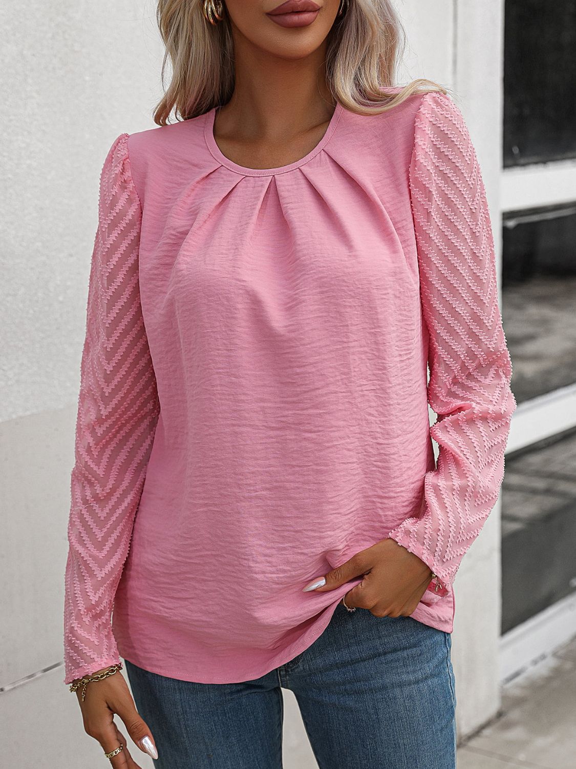 Annalise - Elegante blusa de manga larga acampanada y cuello redondo abullonado