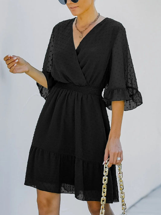 Kelsey - Elegante mini vestido de lunares suizos con mangas acampanadas