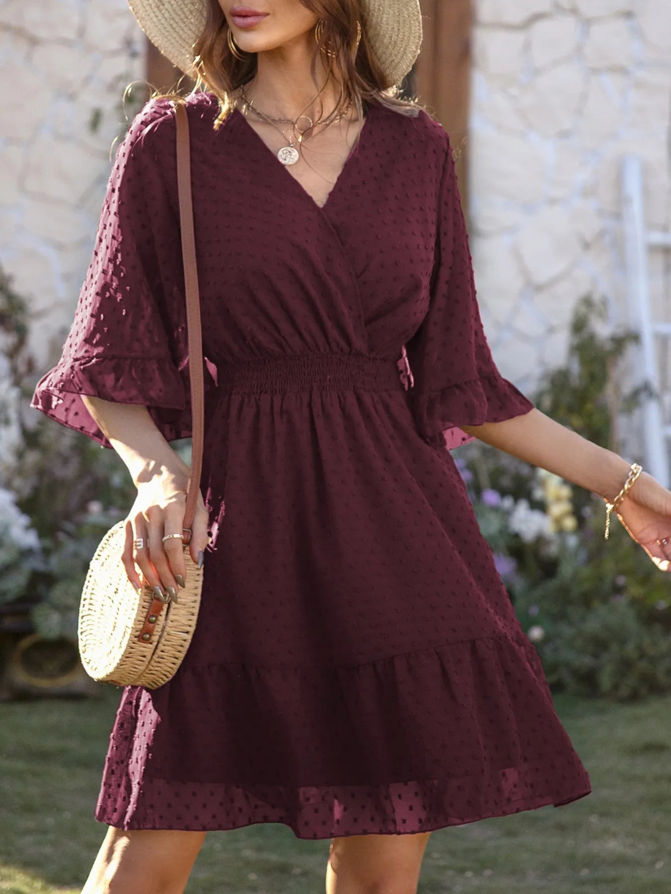Kelsey - Elegante mini vestido de lunares suizos con mangas acampanadas
