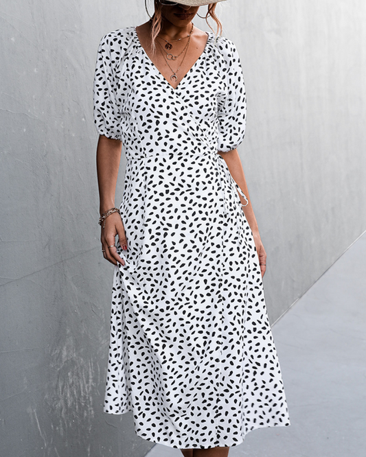 Aicelle - Elegante vestido midi de leopardo con cuello en V