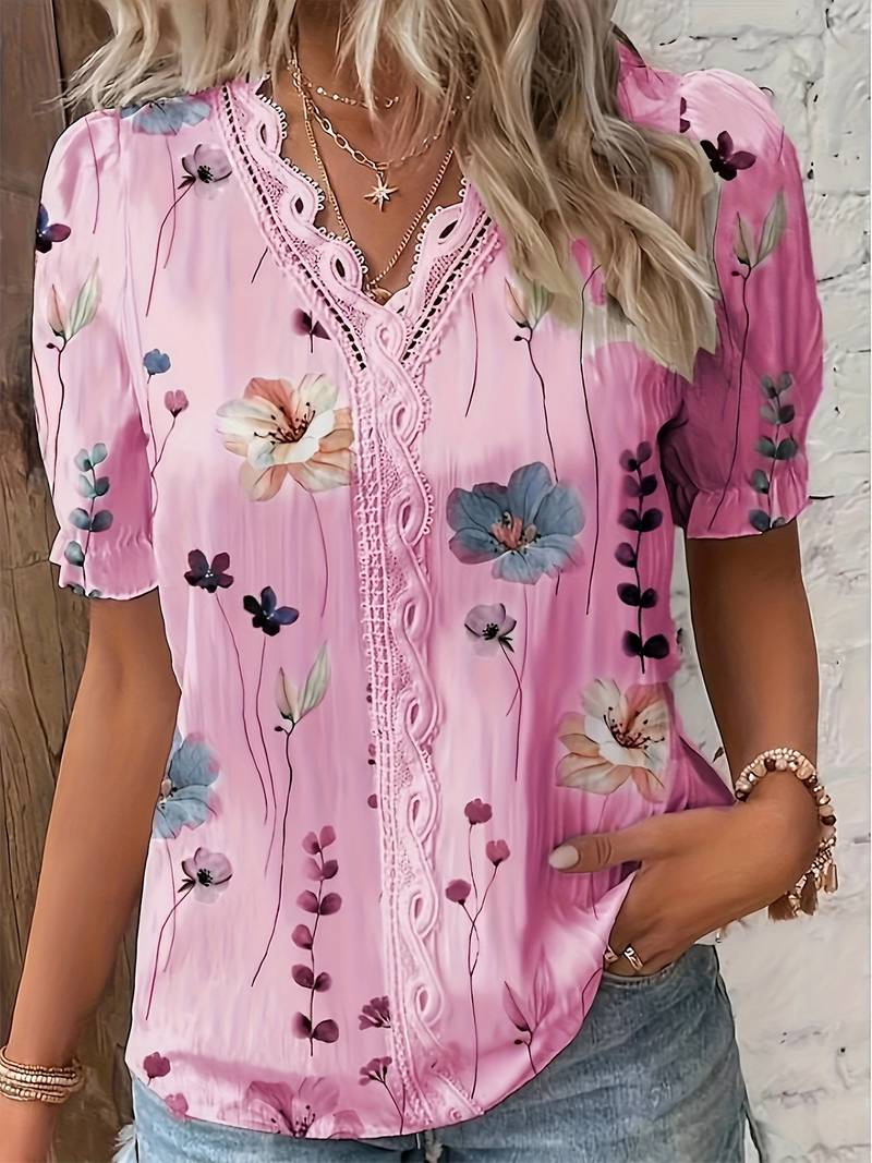 Annette - Elegante blusa floral con cuello de pico