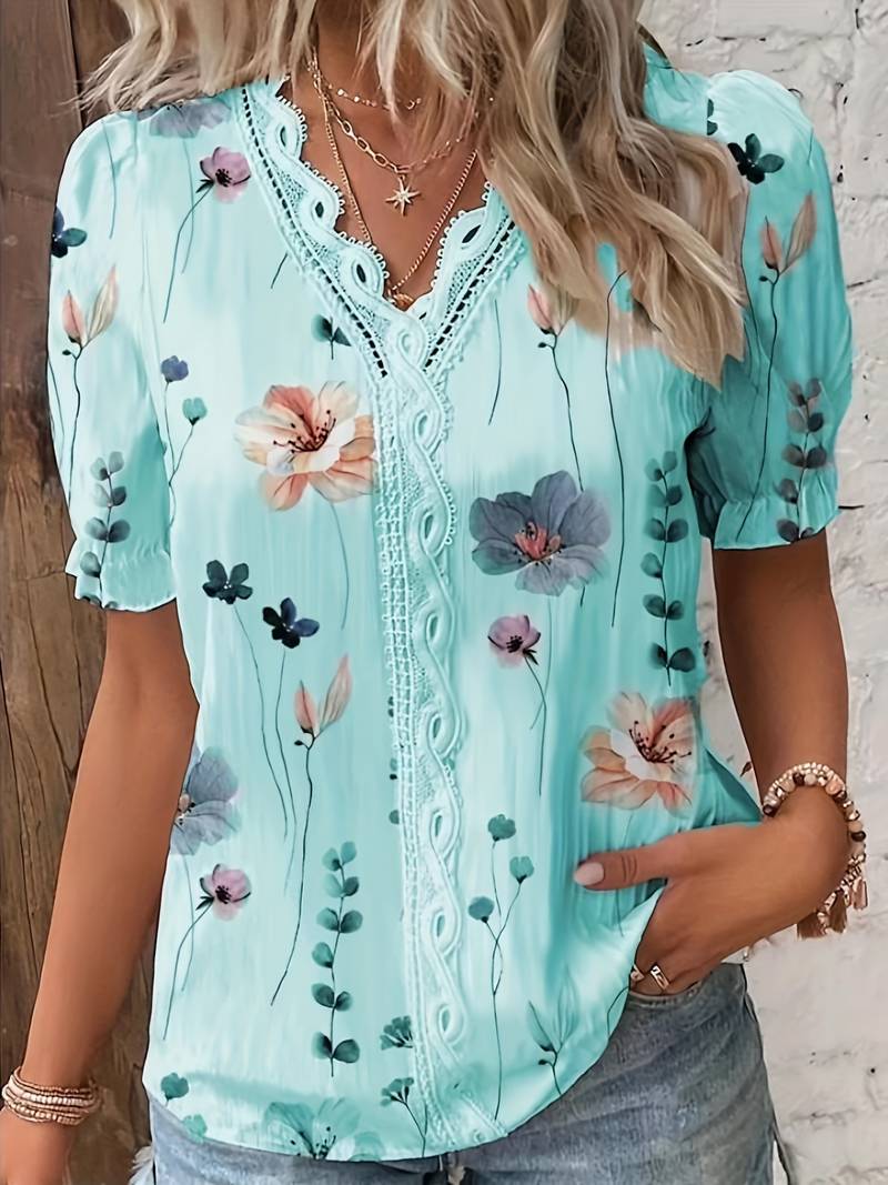 Annette - Elegante blusa floral con cuello de pico