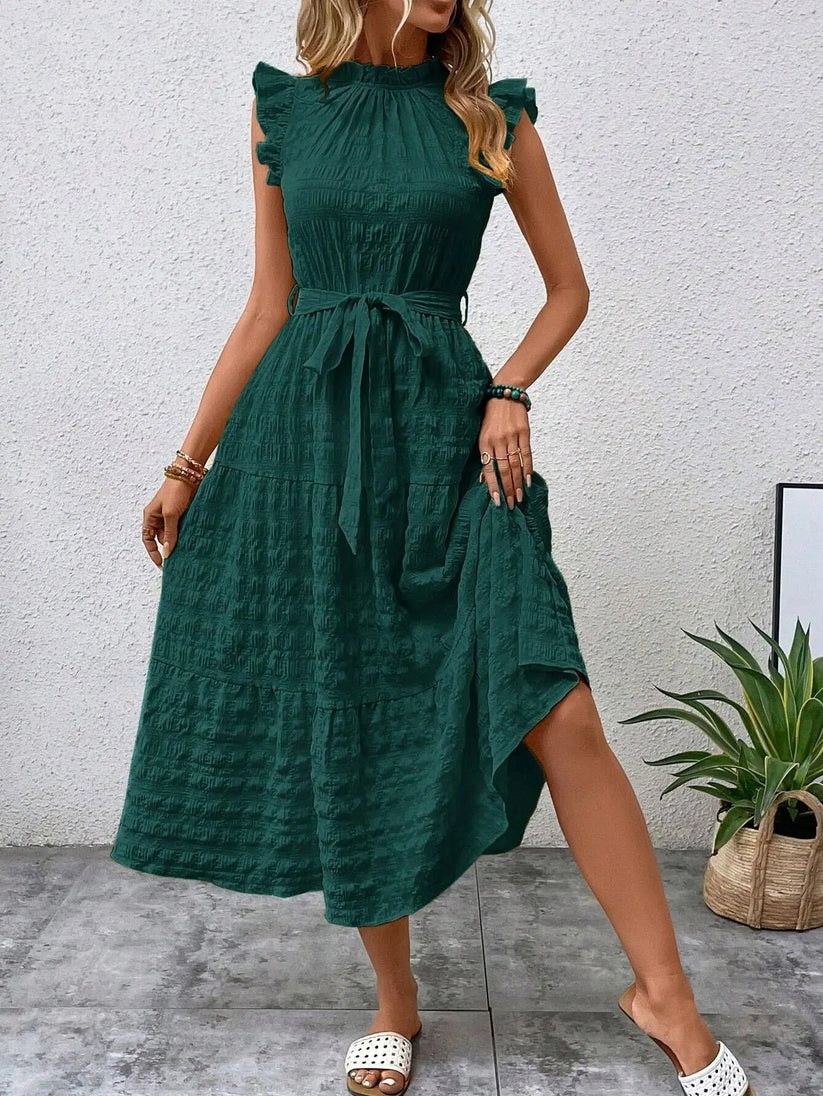 Denise - Elegante vestido con cinturón y volantes