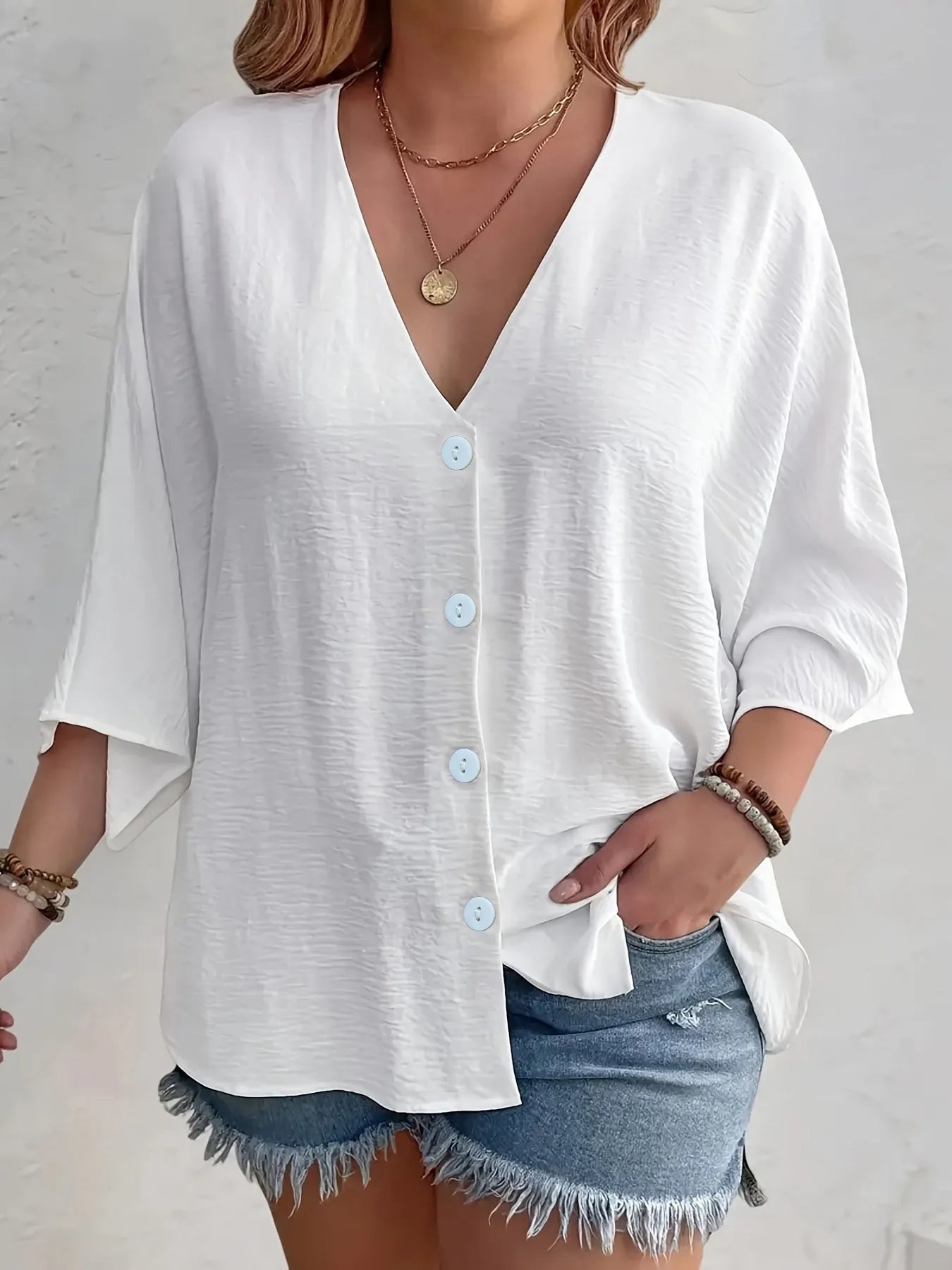 Amirah - Blusa casual suelta de media manga con cuello en V y botones