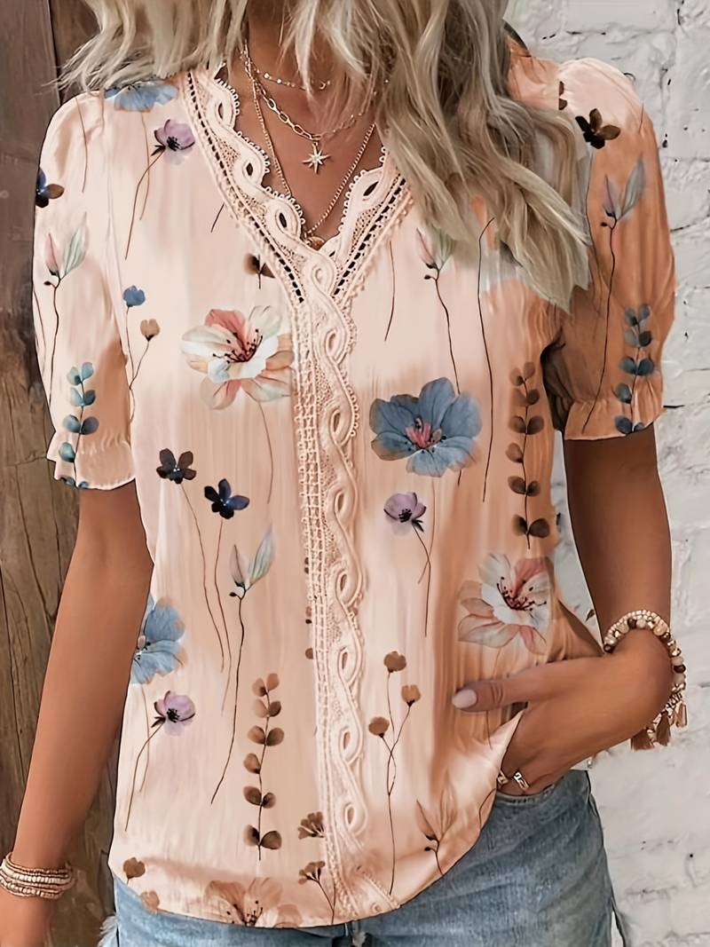 Annette - Elegante blusa floral con cuello de pico