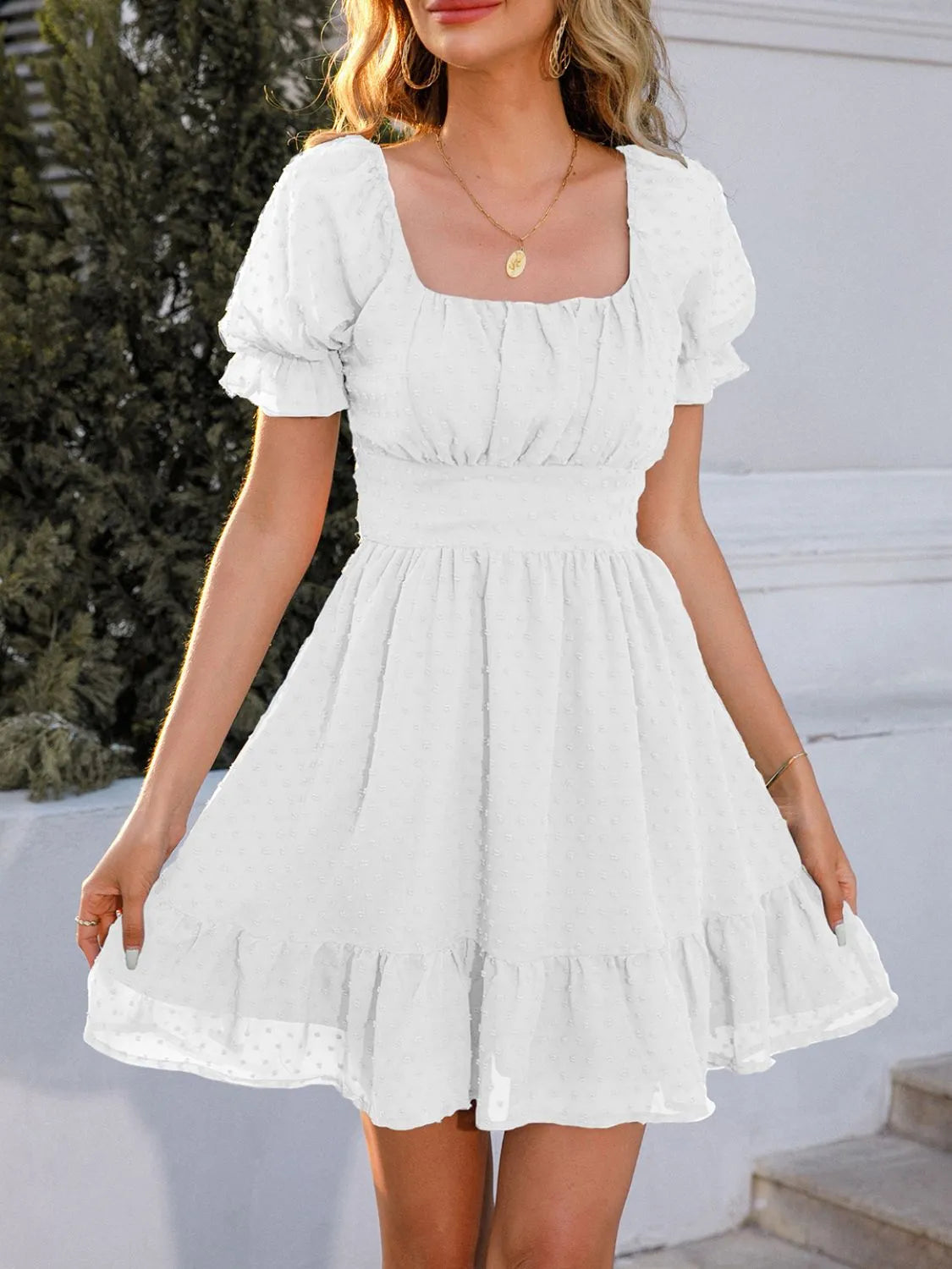 Angelica - Elegante mini vestido de manga corta de lunares suizos