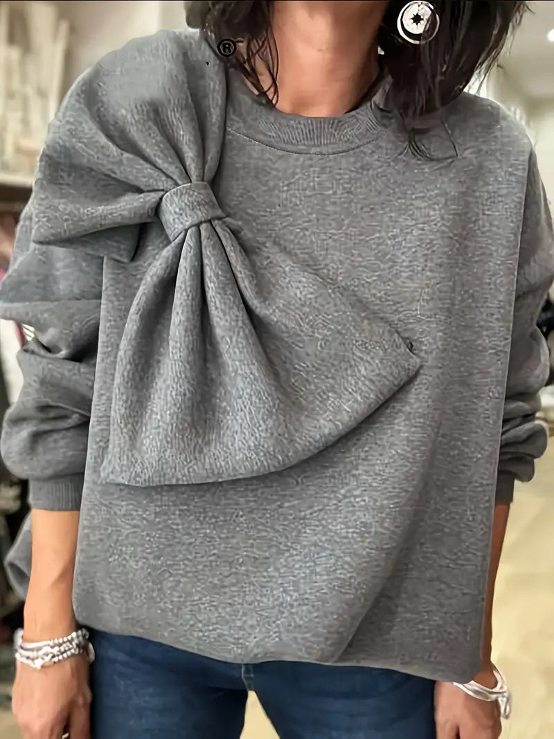Benia – Suéter elegante con un gran lazo