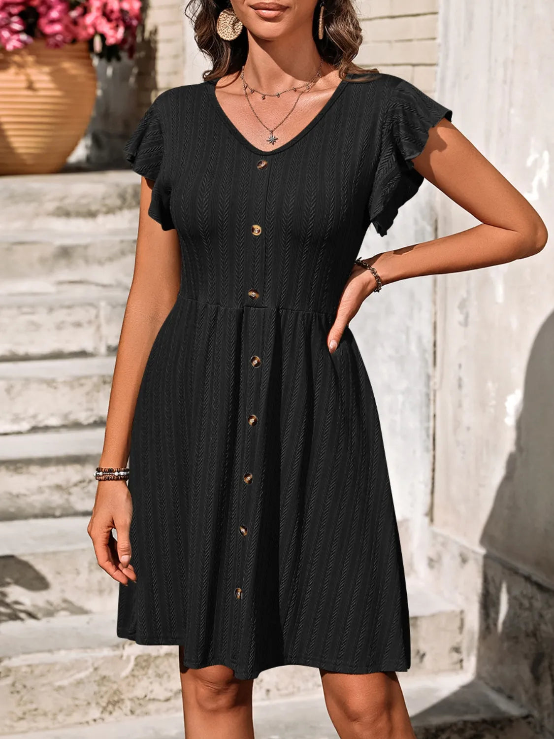Marina - Elegante vestido de manga larga con volantes y cuello en V abotonado