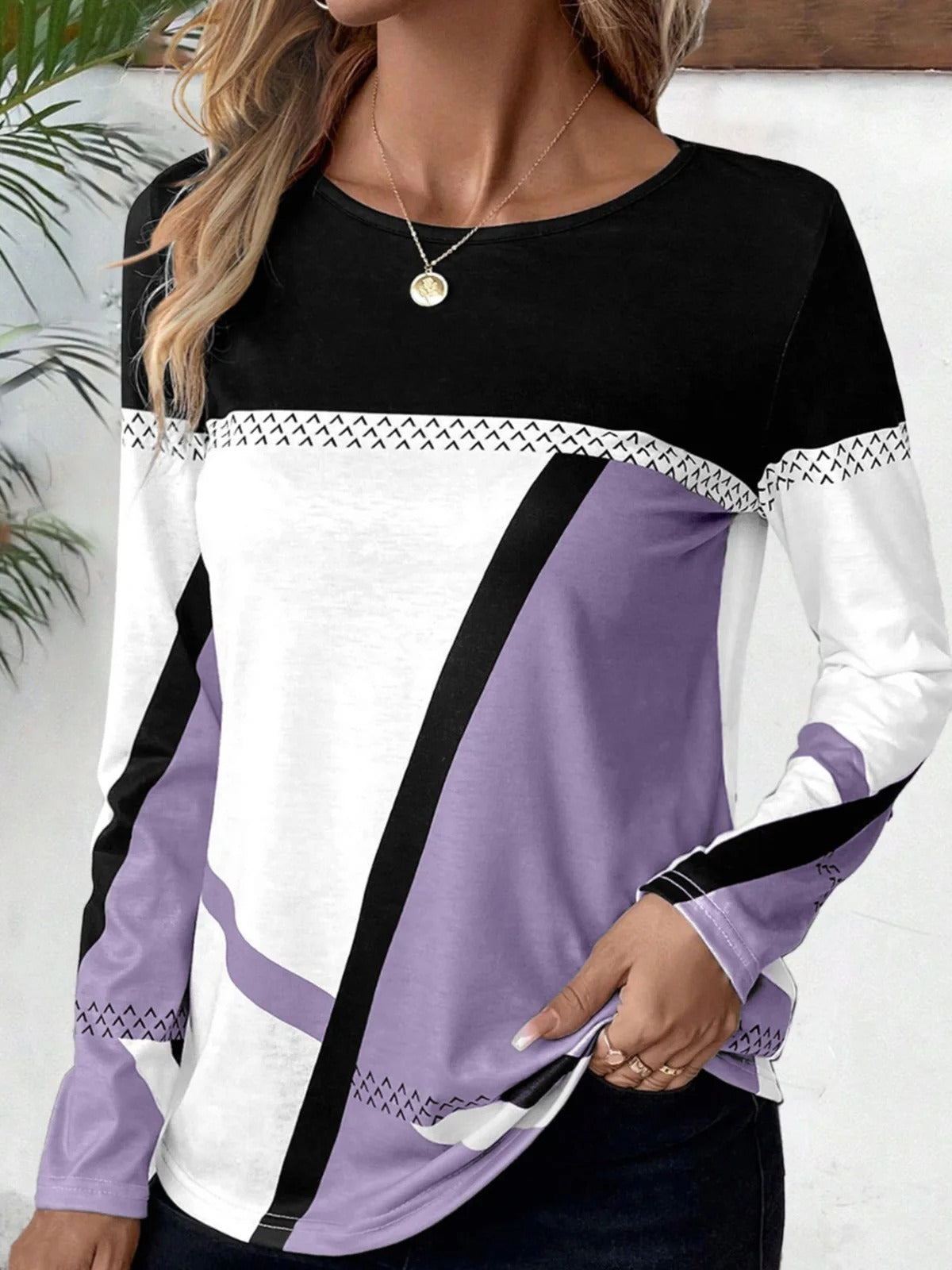 Cathryn - Elegante blusa de manga larga en bloques de color
