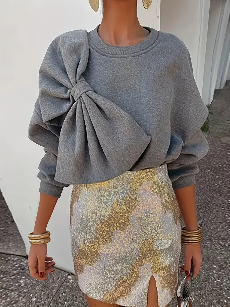 Benia – Suéter elegante con un gran lazo