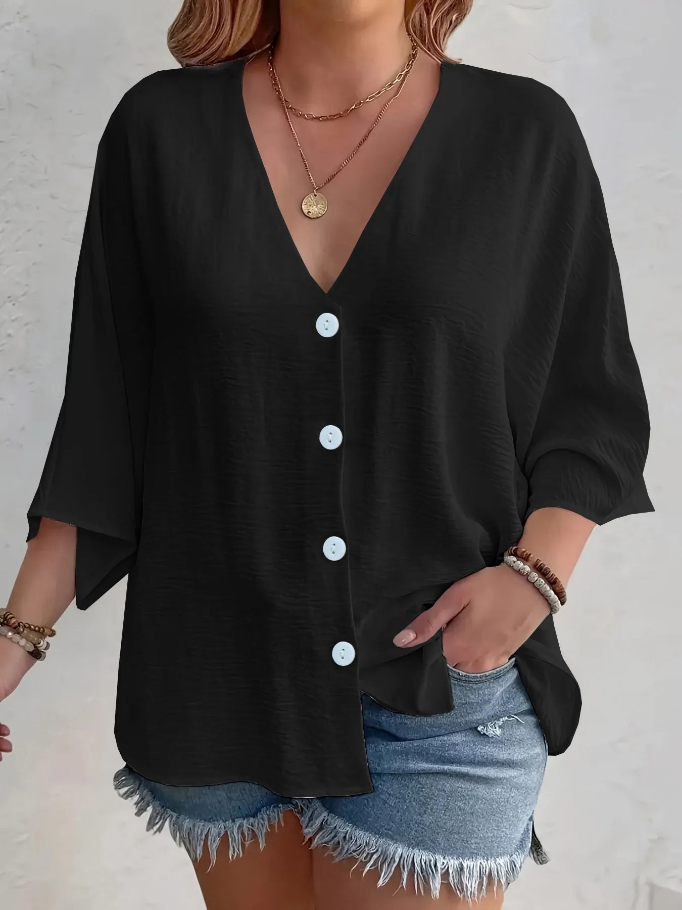 Amirah - Blusa casual suelta de media manga con cuello en V y botones