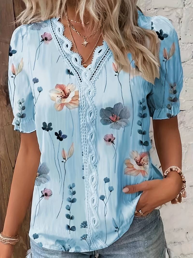 Annette - Elegante blusa floral con cuello de pico