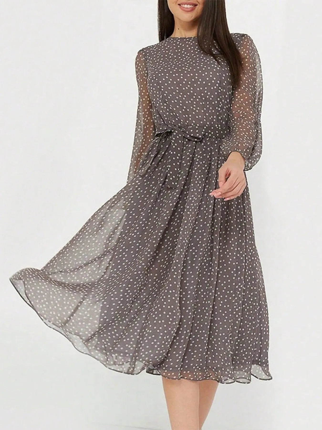 Zahra - Elegante vestido midi de manga larga y cuello redondo con lunares