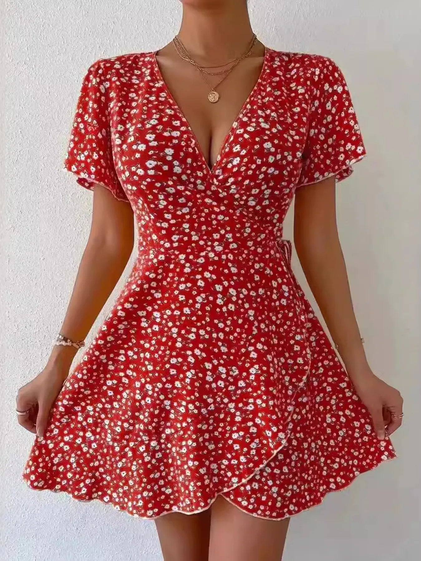 Rosanna - Elegante minivestido floral de manga corta con escote en V profundo