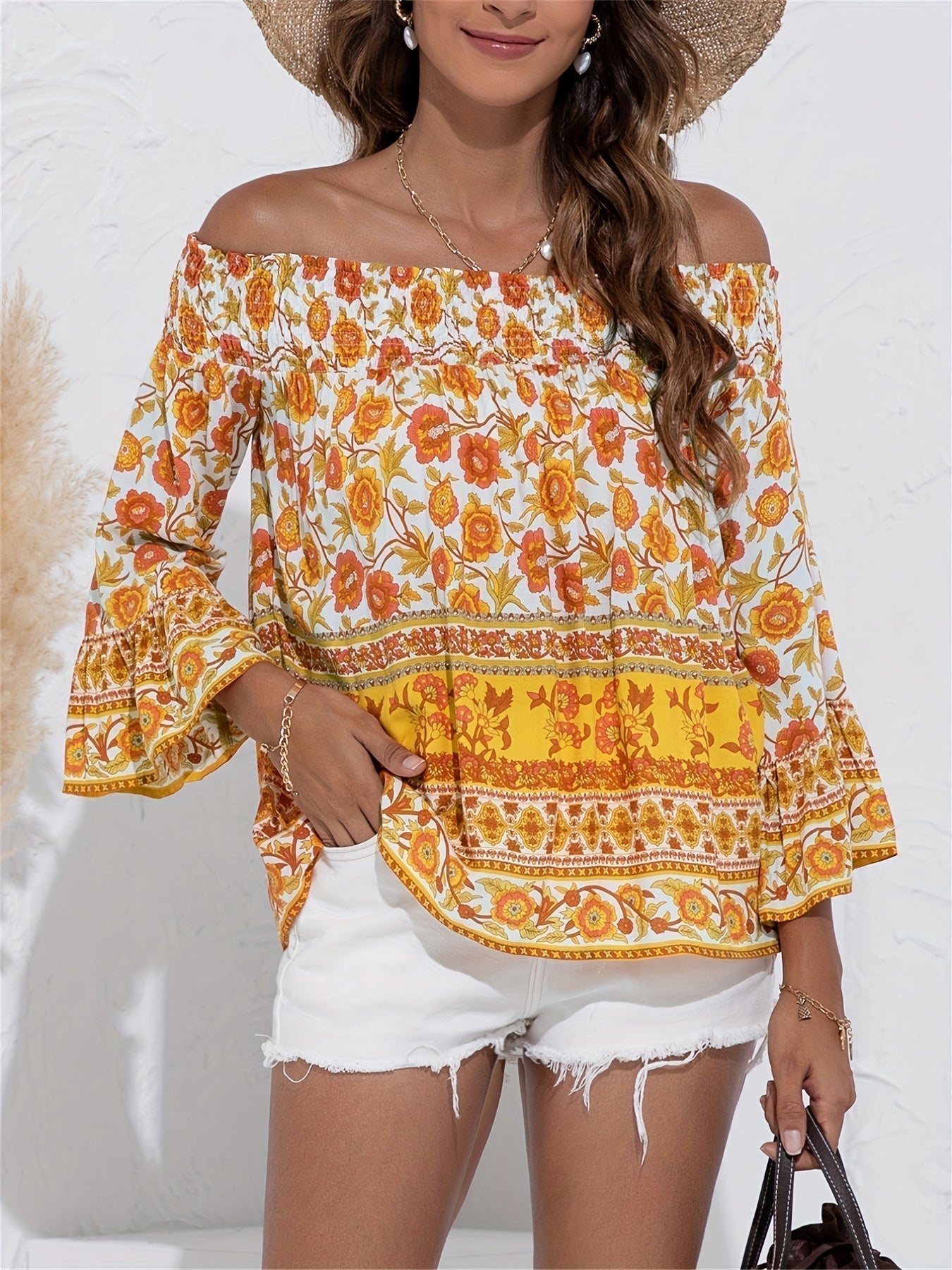 Audrey - Elegante blusa con estampado floral sin hombros