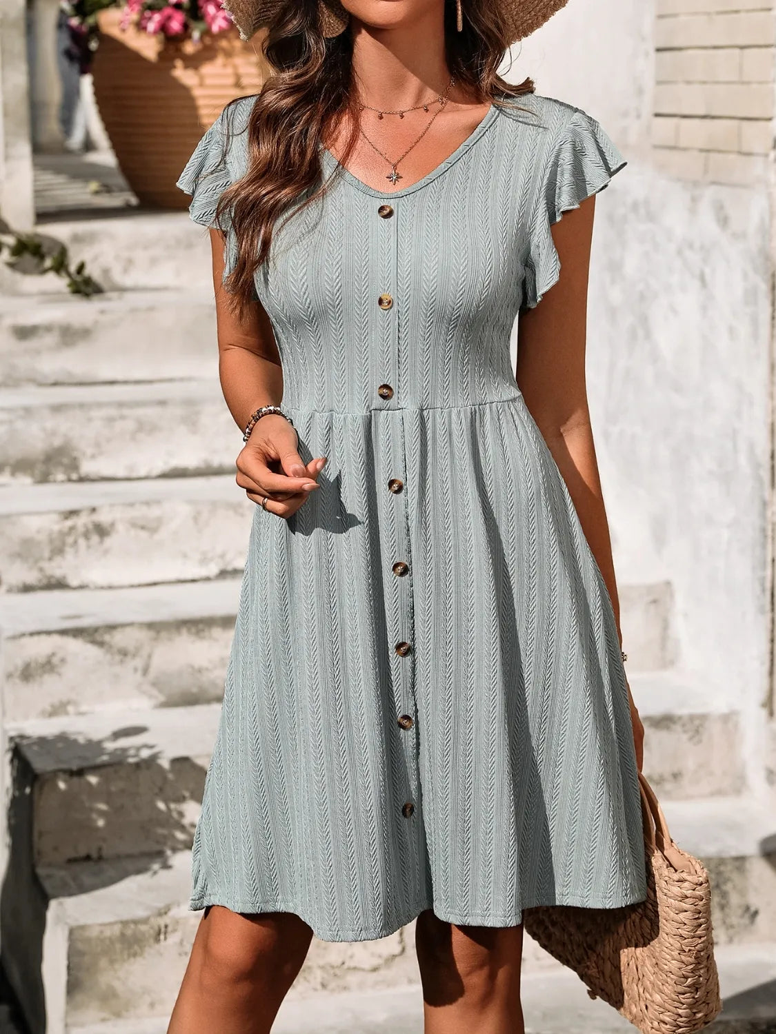 Marina - Elegante vestido de manga larga con volantes y cuello en V abotonado