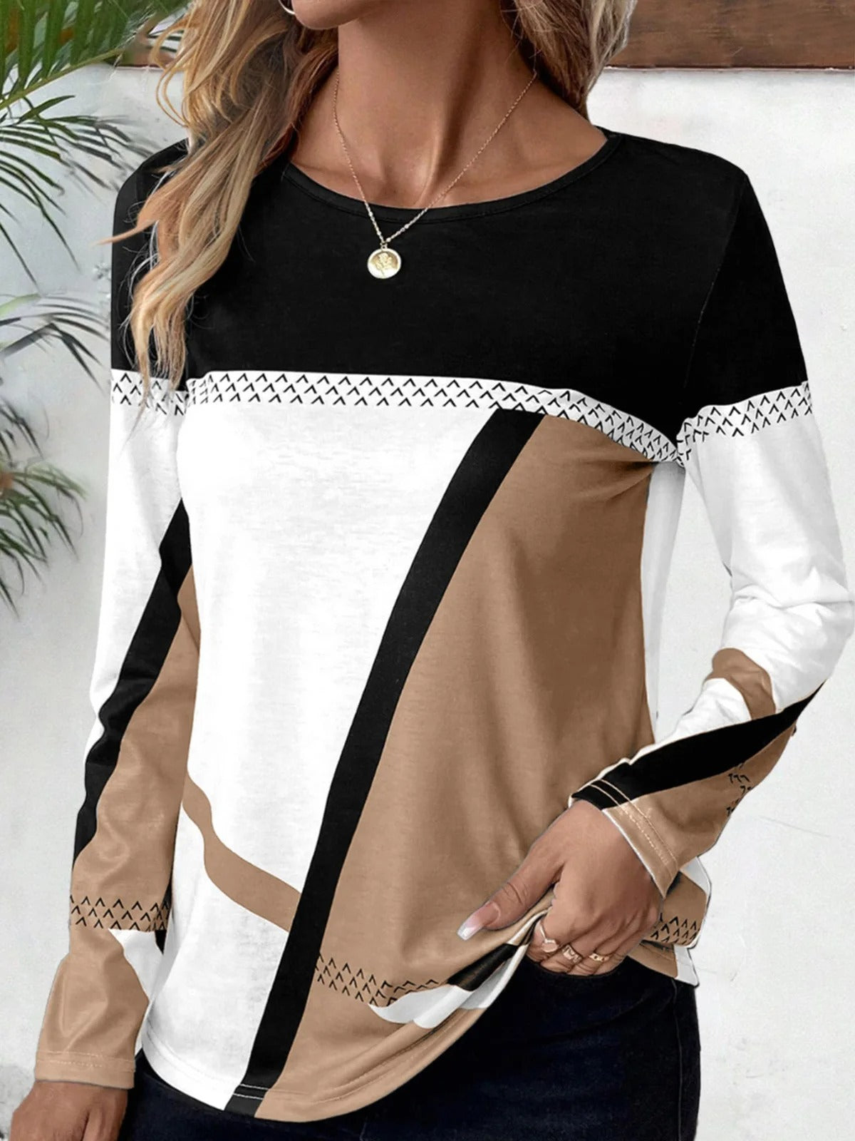 Cathryn - Elegante blusa de manga larga en bloques de color