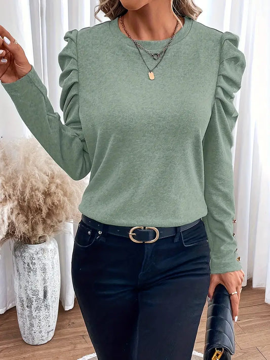 Armeli – Top elegante con mangas abullonada