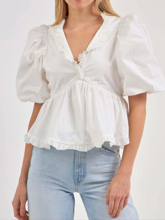 Kath - Elegante blusa peplum con mangas abullonadas