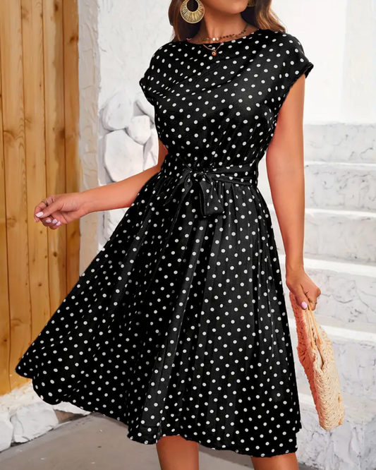 Teresa - Elegante vestido midi de lunares con cinturón de anudar