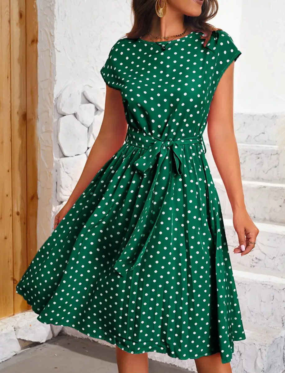 Teresa - Elegante vestido midi de lunares con cinturón de anudar