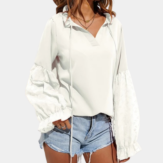 Xamira - Elegante blusa suelta de manga farol con cuello anudado