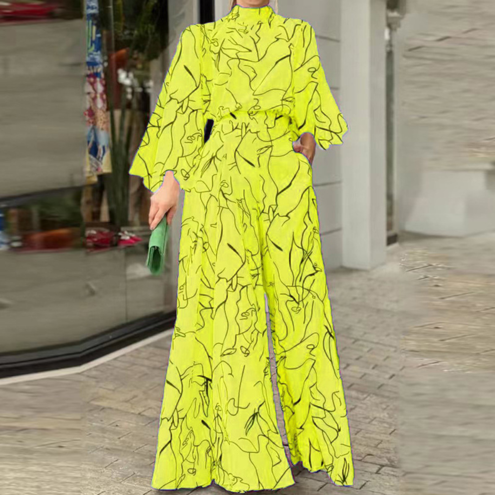 Celia - Elegante mono de manga larga con estampado abstracto