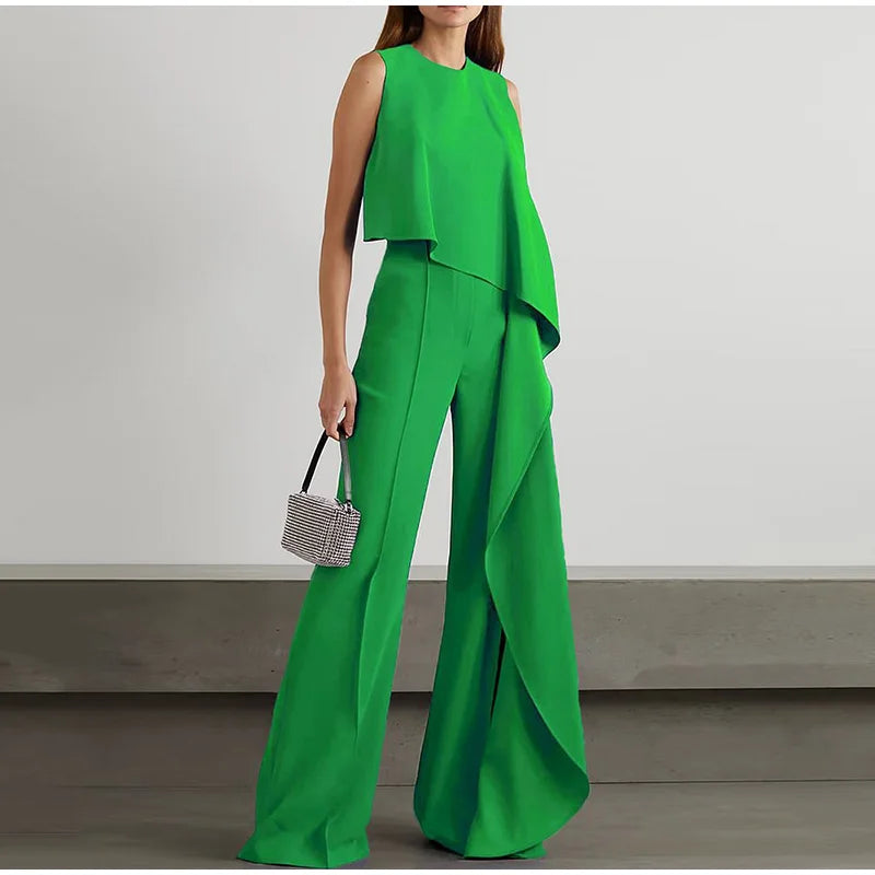 Tressa - Elegante mono de pierna ancha con volante y sin mangas