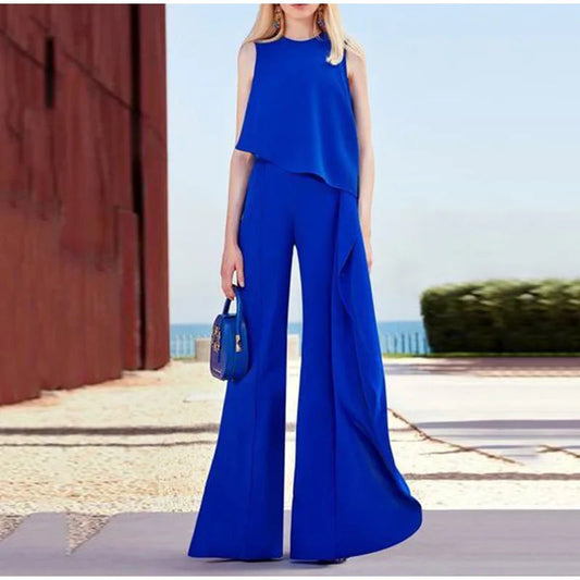 Tressa - Elegante mono de pierna ancha con volante y sin mangas