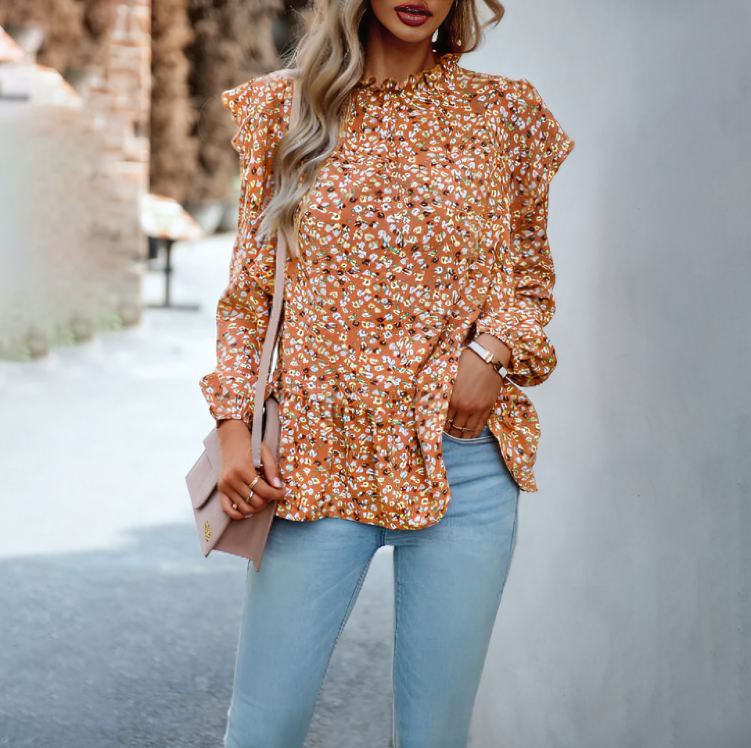 Coralyn - Elegante blusa floral de manga larga