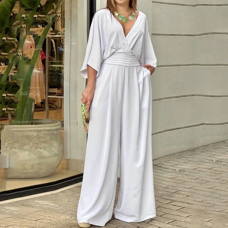 Manuela - Elegante mono holgado con escote en V y manga murciélago y pierna ancha