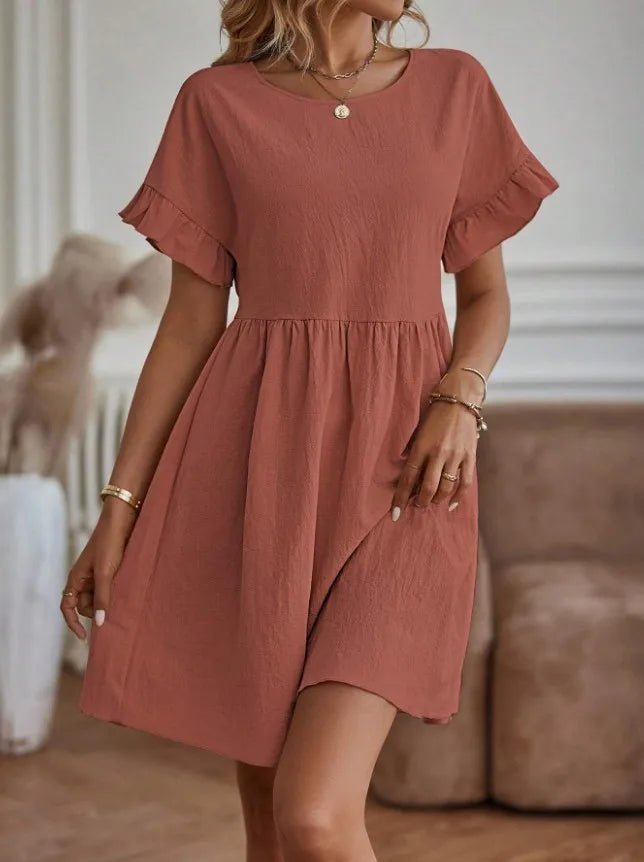 Sapphira - Minivestido holgado de manga corta con volantes
